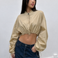 Veste crop beige, poignets froncés à liens de serrage