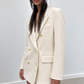Manteau court double face porté ouvert