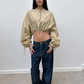 Veste crop beige à manches bouffantes