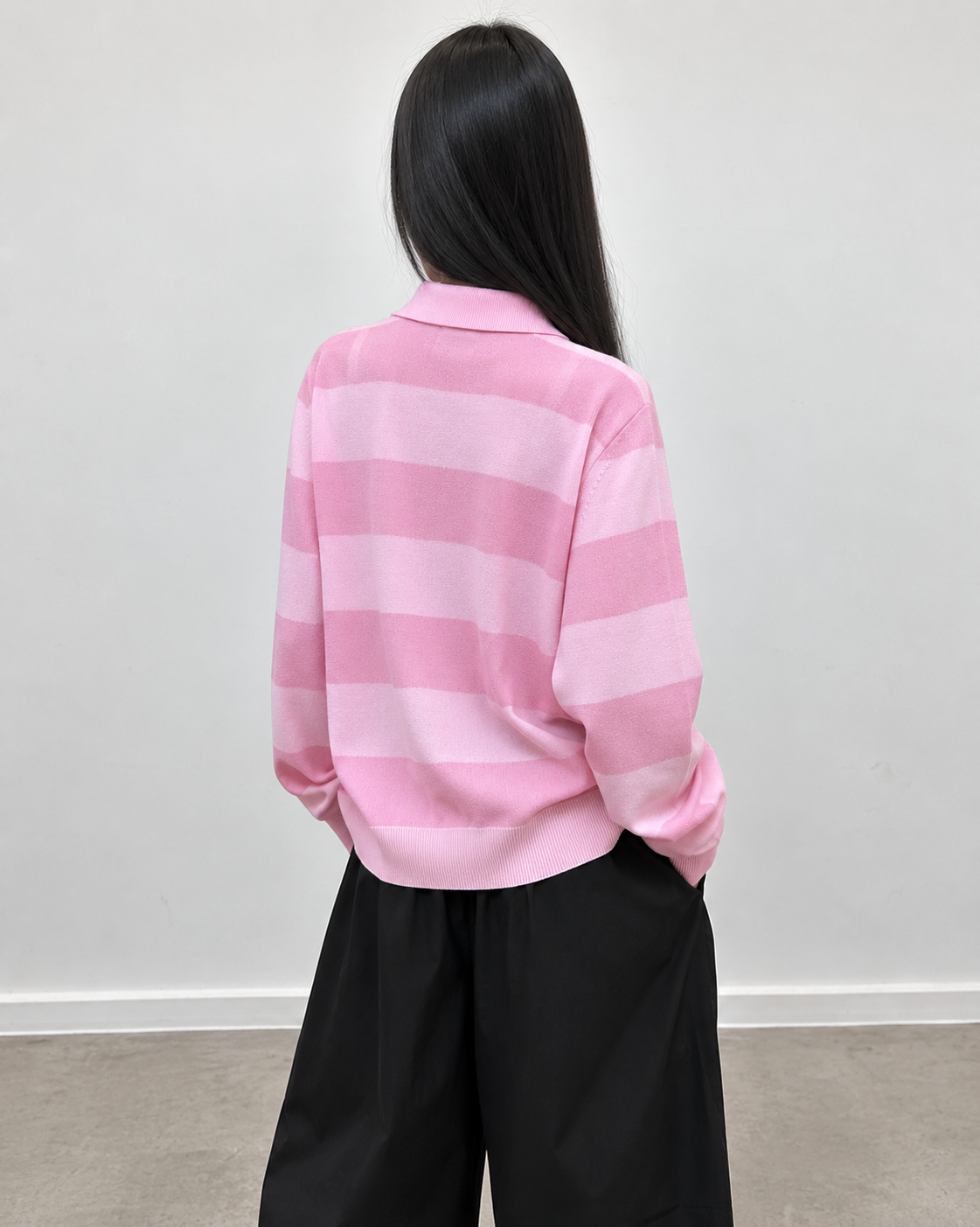 Chemise en maille rose, détail du boutonnage