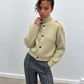 Cardigan boutonné à col montant vert pâle, vue de face