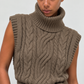 Pull sans manches en maille torsadée, détail de la ceinture