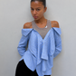 Chemise rayée effet superposé portée par une mannequin