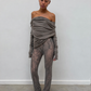 Top drapé porté avec un pantalon taille haute