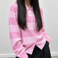 Chemise en maille rose, détail de la maille