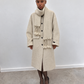 Manteau long écru, détail des franges