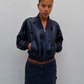 Veste baseball à sequins, détail des finitions