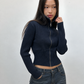 Pull bleu marine en maille côtelée à col montant zippé