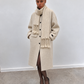 Manteau long écru avec écharpe à franges intégrée
